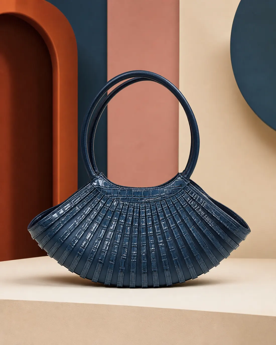Borsa Kora Abyss OSA in pelle stampa coccodrillo color petrolio con radiali a ventaglio e manici ad anello